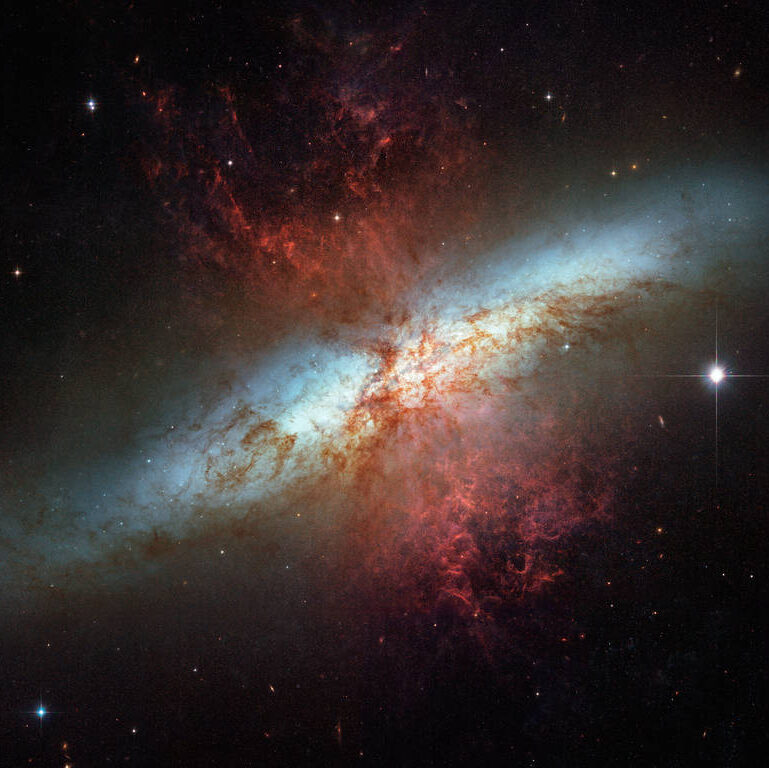 image of M82 showing the material outflowing